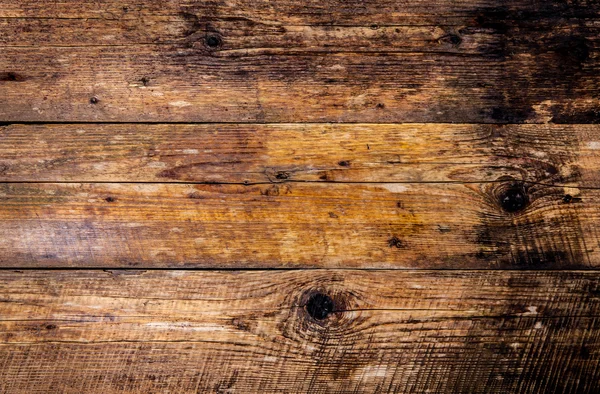 La textura marrón de madera vieja con nudo — Foto de Stock