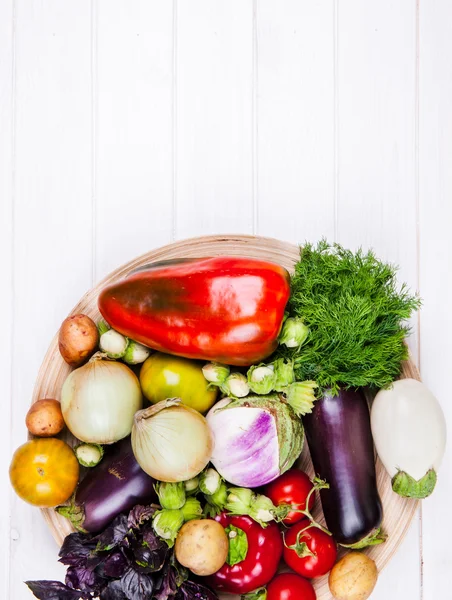 Fresh vegetables on white wooden background — Stock Photo, Image