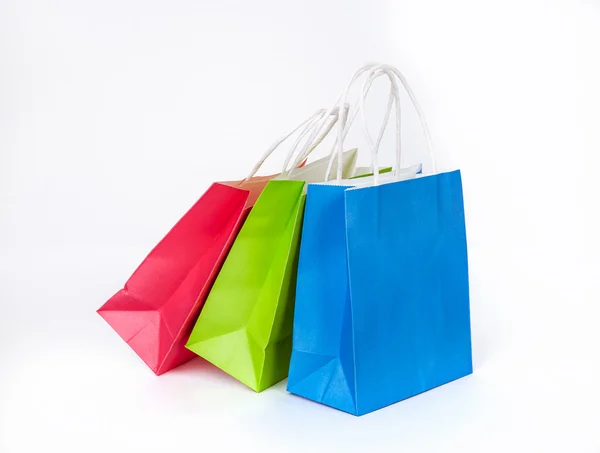 Pestrobarevné nákupní tašky, prodej, nákup — Stock fotografie