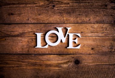 Kelime '' aşk '' eski bir ahşap plakalar. St. Valentine's Day
