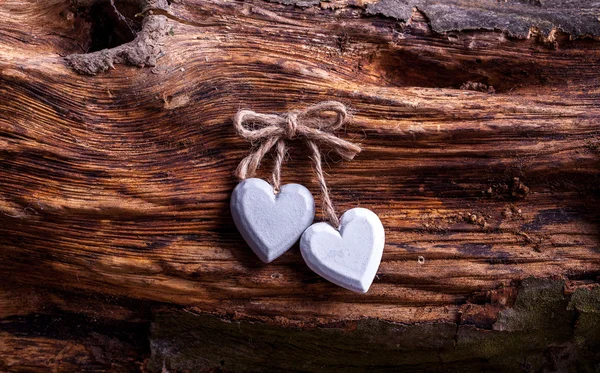 Corazón sobre fondo de madera. Estilo vintage. — Foto de Stock