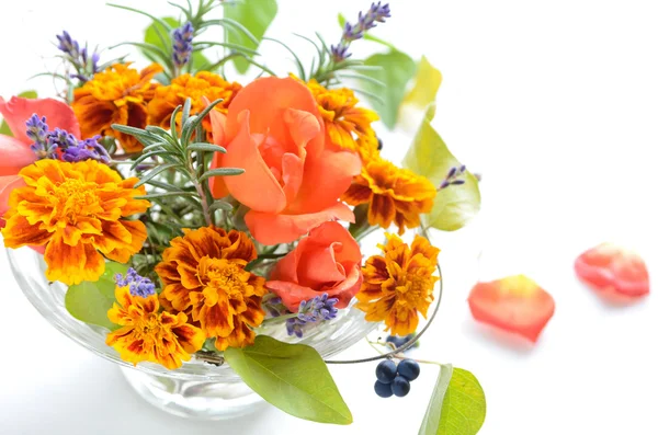 Rose and marigold in arrangement — Stock Photo, Image