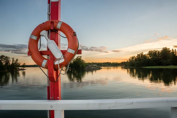 Life ring on sunset time in Seurasaari Helsinki — Stock Photo, Image