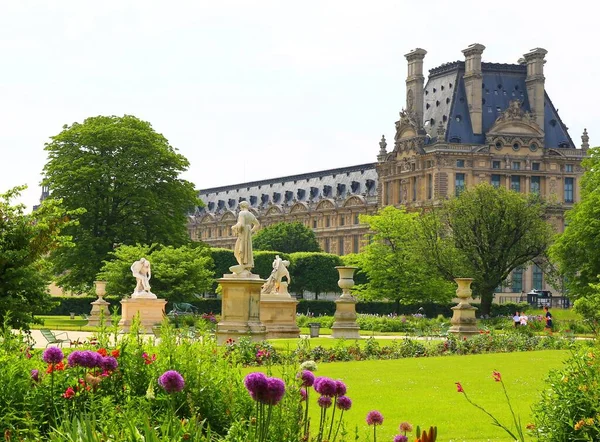 The beautiful lush gardens of Tuileries in the center of Paris