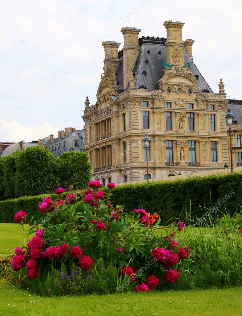 The beautiful lush gardens of Tuileries in the center of Paris
