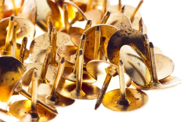 Golden pins — Stock Photo, Image