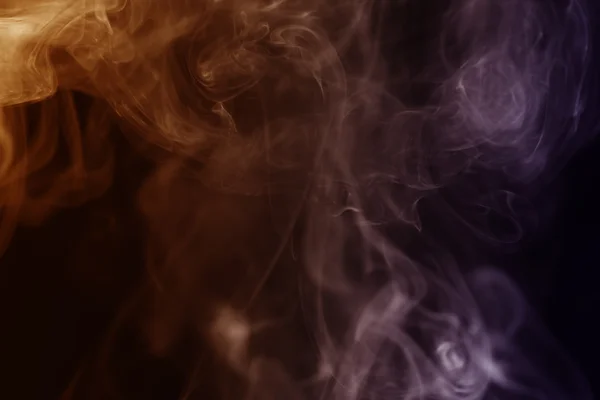 Colorful of smoke on black background. — Stock Photo, Image