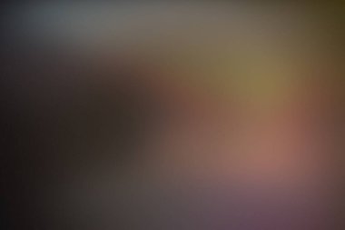 Huysuz, bulanık, soyut bir arka plan. Koyu gri, kahverengi ve ince mor tonlara sahip yumuşak, atmosferik bir dokusu var..