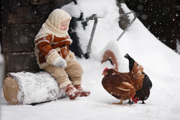 The girl with the hens — Stock Photo, Image