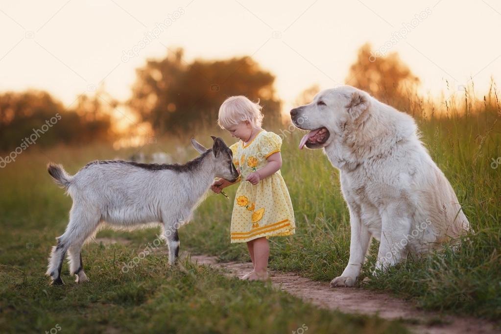 The girl with the kid and the dog