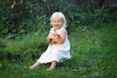 The girl with the duckling