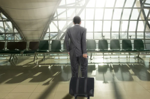 Man with suitcase in terminal airport — Stock Photo, Image