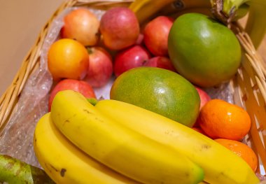 Hot and steaming freshly boiled peas, beans, carrots and cauliflower being strained through a stainless steel colander prior to serving for dinner