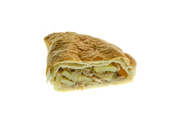 Beyaz arka planda yarı izole edilmiş bir Cornish hamur kesimine yaklaş