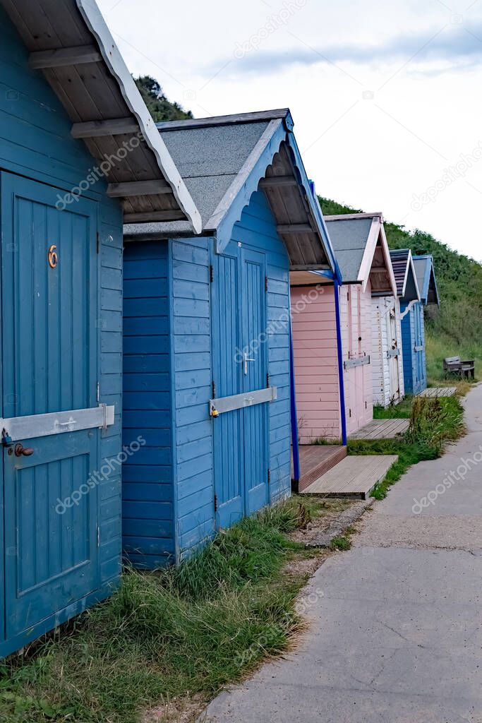 Traditional wooden beach huts on Cromer seafront on the North Norfolk Coast