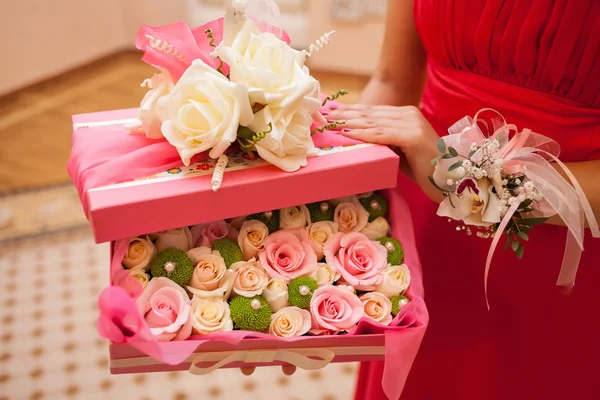 Flowers in a pink box — Stock Photo, Image