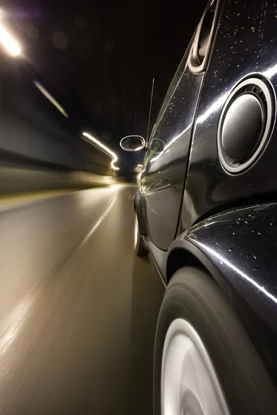 Car in motion at night — Stock Photo, Image