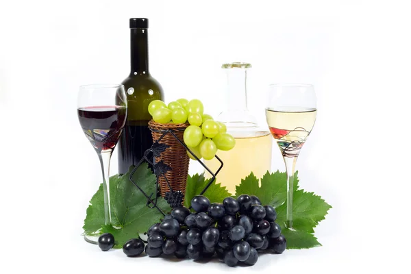 Fresh Red and White Grapes with Green Leaves, Two Wine Glass Cups and Wine Bottles Filled with Red and White Wine  Isolated on White — Stock Photo, Image