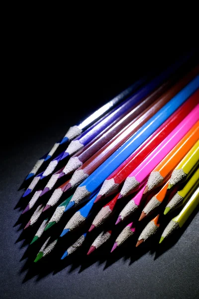 Macro Shot of Sharpened Colorful Pencils Against Black Background — Stock Photo, Image