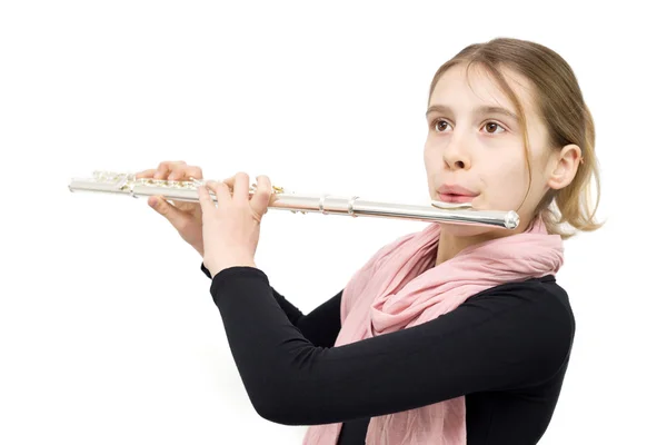 Estúdio tiro de menina tocando flauta contra fundo branco — Fotografia de Stock