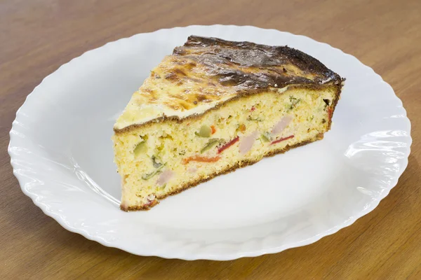 Slice of Freshly Baked Cornbread With Vegetables and Ham on White Plate — Stock Photo, Image