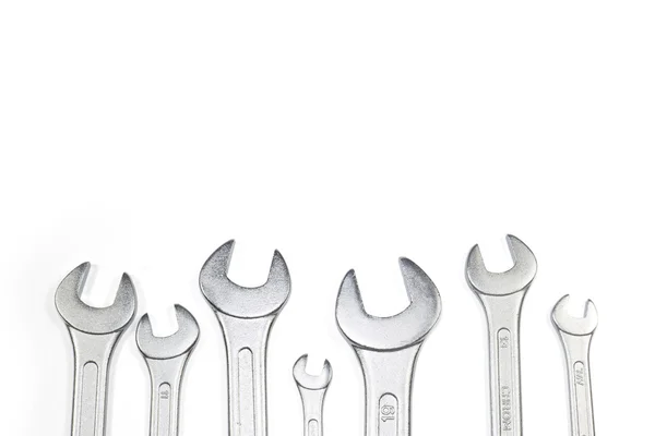 Heap Of Stainless Steel Spanners Of Different Sizes Isolated On White, View From The Top — Stock Photo, Image