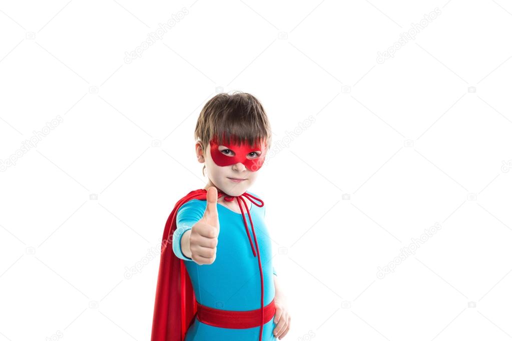 Young boy superhero giving you a thumbs up.