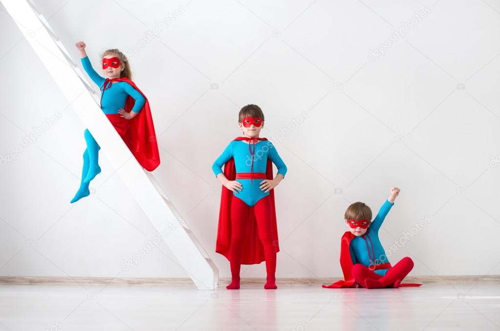 Kids superheroes on white background.