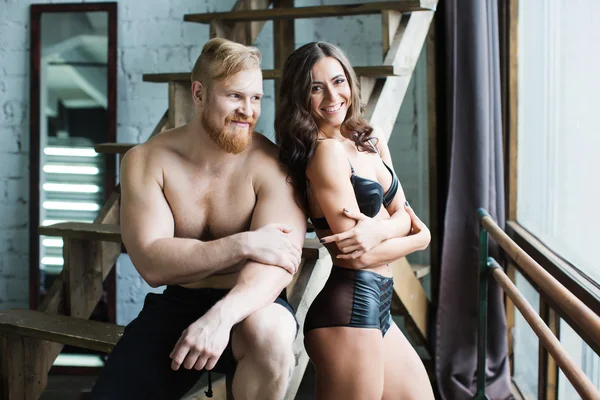 Sexy couple, muscular man and a beautiful woman. — Stock Photo, Image