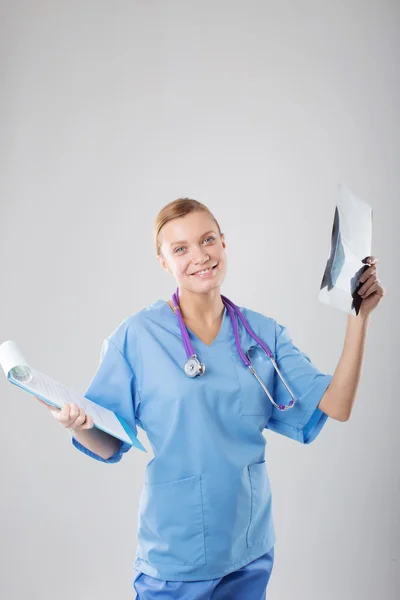 Beautiful young female medical intern with tablet computer — Stock Photo, Image