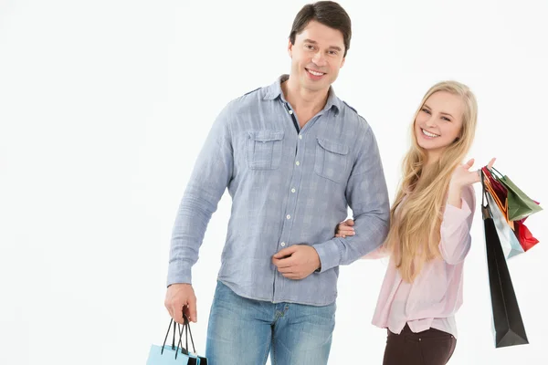 Couple with shopping bags Royalty Free Stock Images