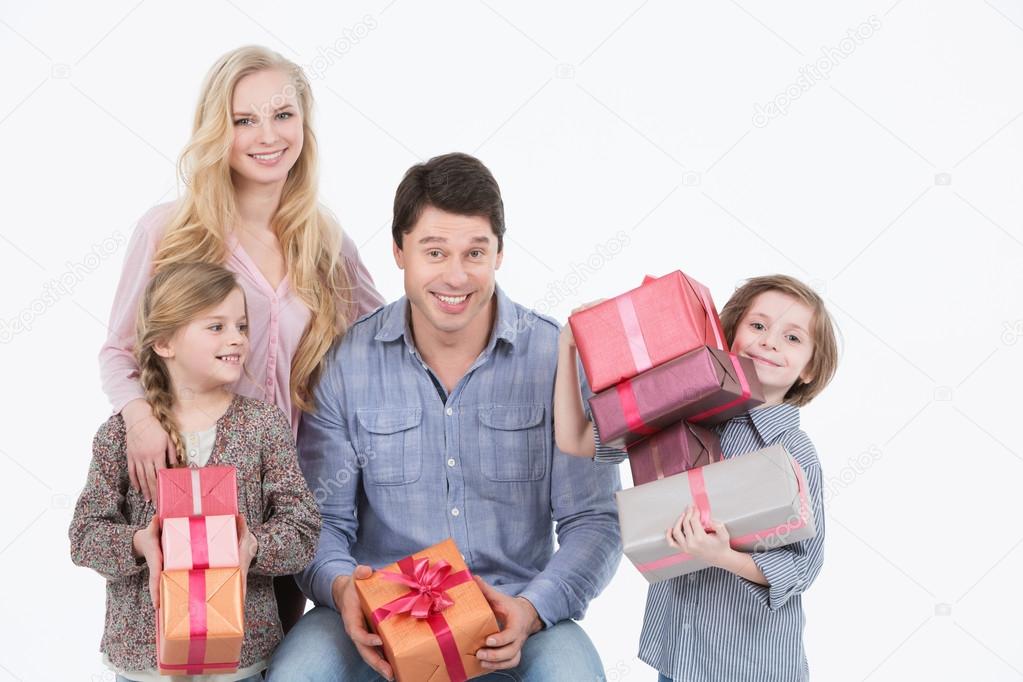 Happy family with gifts.