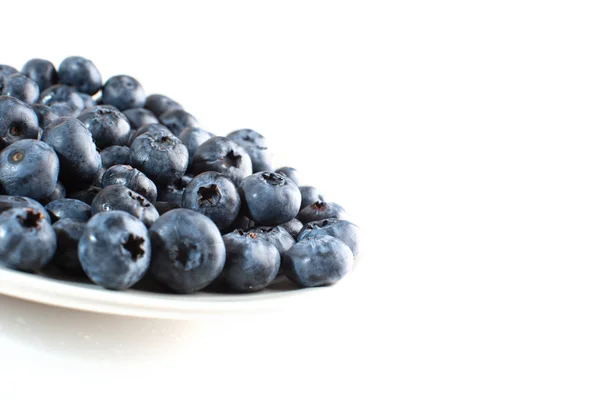 Teller mit Blaubeeren — Stockfoto