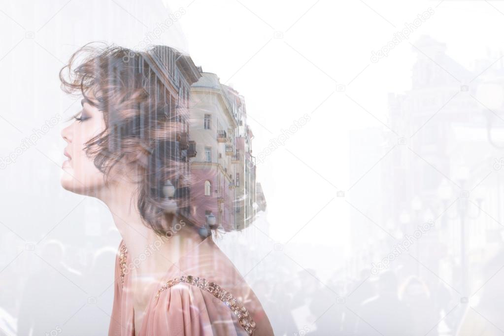 Double exposure woman and city. 