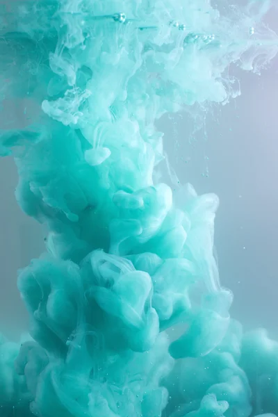 Turquoise Ink in water. — Stock Photo, Image