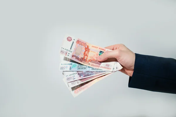 Російські рублі банкнот в руці — стокове фото