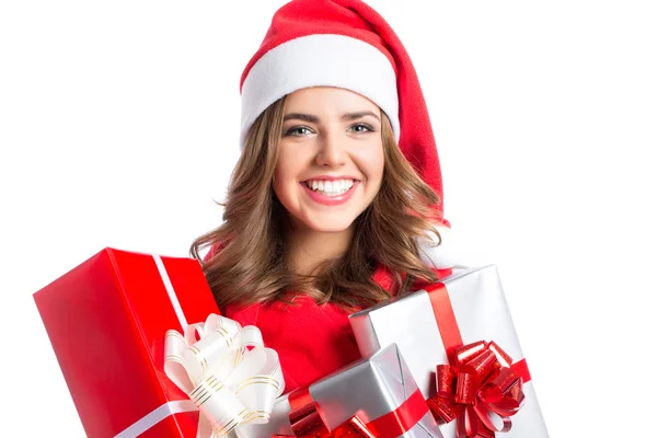 Aranyos nő tartja karácsonyi és újévi ajándékok. Karácsonyi lány santa kalap dobozok. — Stock Fotó