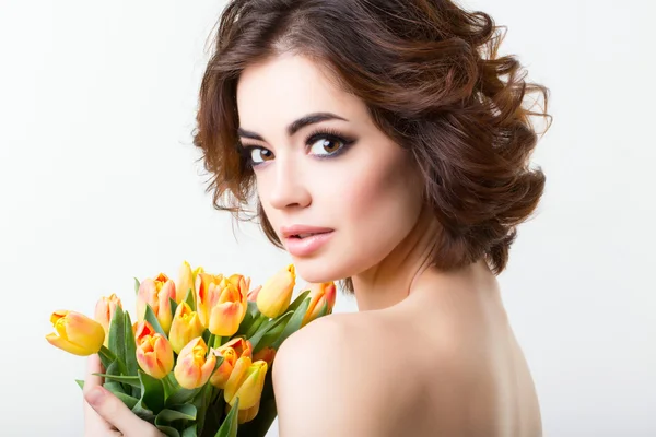 Woman with tulips. — Stock Photo, Image