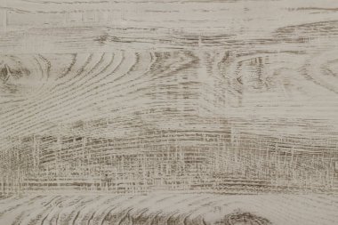 Beyaz ahşap kalasların yakın plan çekimleri. Arka plan için desenli ve desenli.