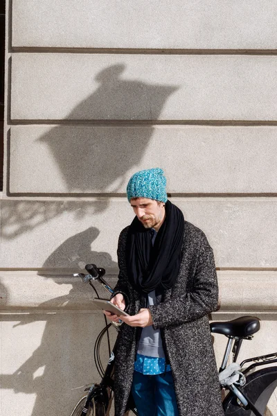 Man thinking while reading on his Ebook — Stock Photo, Image