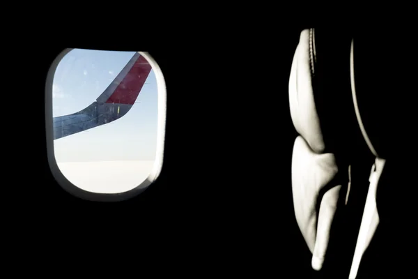 Ala y asiento de vuelo iluminado — Foto de Stock