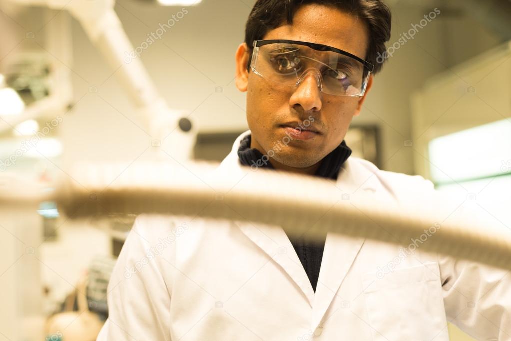 Researcher working with Liquid Nitrogen