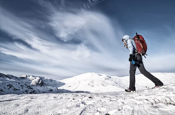 Female hiker with red backpack — Stock Photo, Image