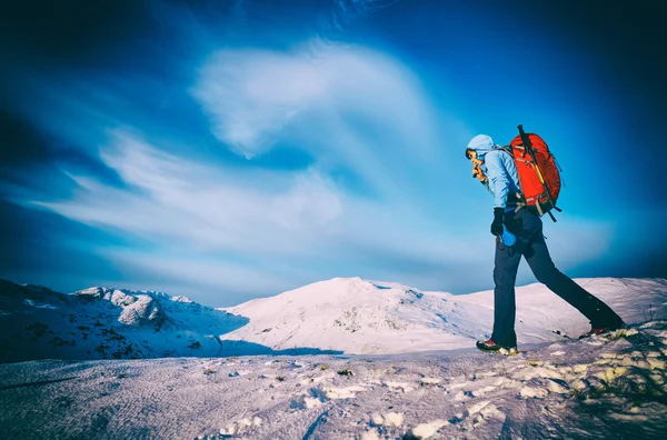 Female hiker with red backpack — Stock Photo, Image