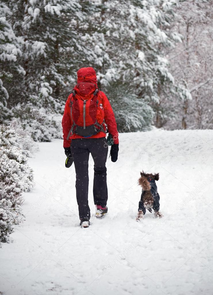 Female hiker and her dog