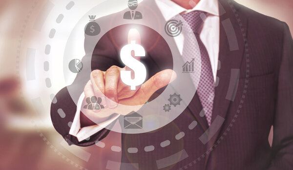 Businessman pressing on digital button