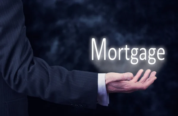 Businessman with Mortgage inscription — Stock Photo, Image