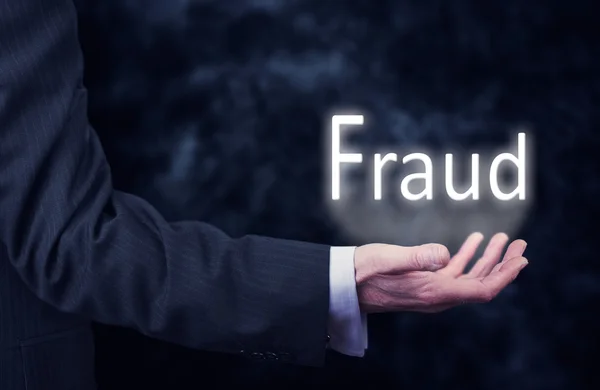 Empresario con inscripción de fraude — Foto de Stock