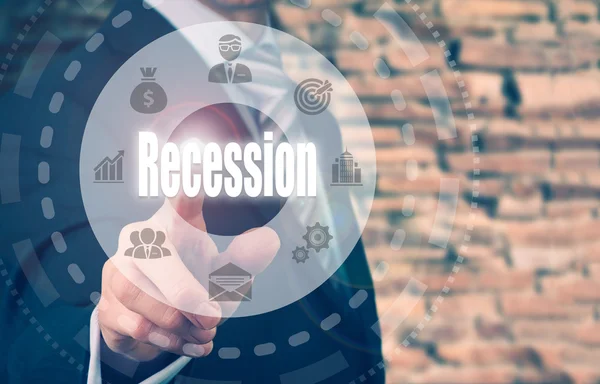 Affärsman att välja en Recession-knappen — Stockfoto