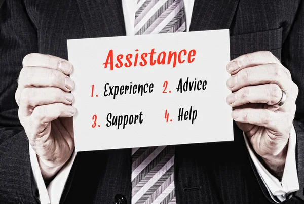 Assistance Concept on business card — Stock Photo, Image